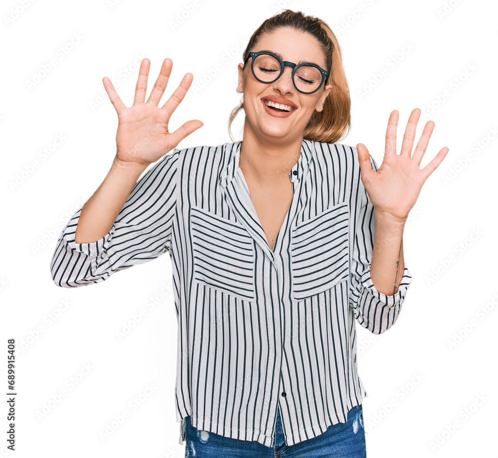 Young caucasian woman wearing business shirt and glasses showing and pointing up with fingers number ten while smiling confident and happy. Young caucasian woman wearing business shirt and glasses showing and pointing up with fingers number ten while smiling confident and happy.