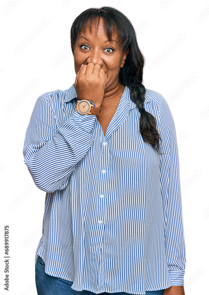 Hispanic middle age woman wearing casual clothes looking stressed and nervous with hands on mouth biting nails. anxiety problem.