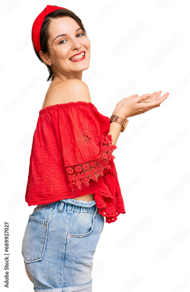 Young brunette woman with short hair wearing casual summer clothes and diadem pointing aside with hands open palms showing copy space, presenting advertisement smiling excited happy Young brunette woman with short hair wearing casual summer clothes and diadem pointing aside with hands open palms showing copy space, presenting advertisement smiling excited happy