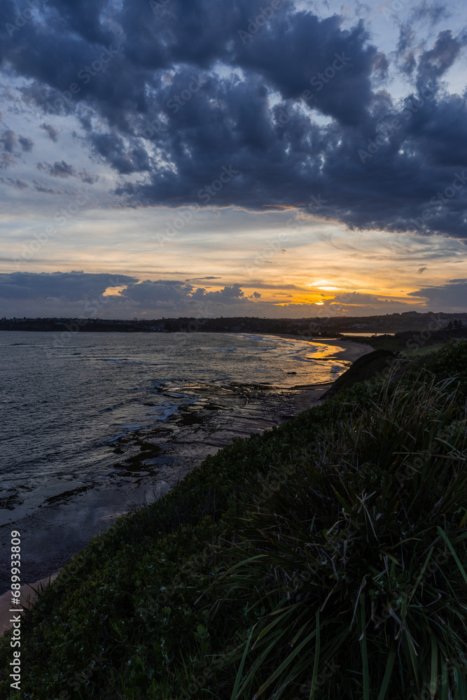 Cloudy sunset view at Long Reef headland, Sydney, Australia.