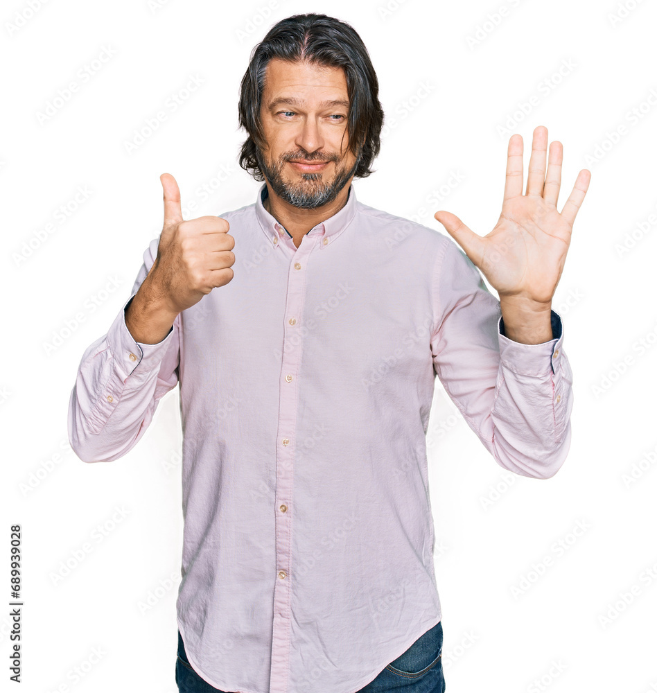 Middle age handsome man wearing business shirt showing and pointing up with fingers number six while smiling confident and happy. Middle age handsome man wearing business shirt showing and pointing up with fingers number six while smiling confident and happy.