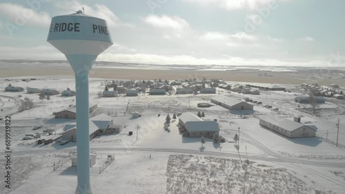 Serene Winter Scene at Pine Ridge Indian Reservation with Central Water Tower photo