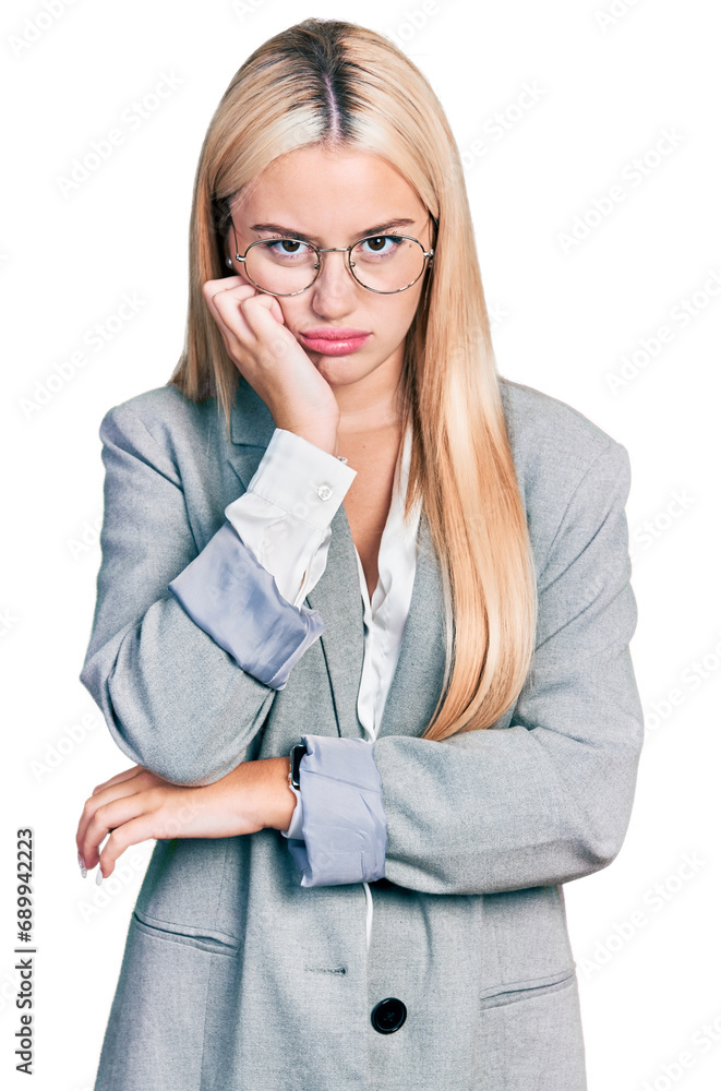 Beautiful blonde woman wearing business jacket and glasses thinking looking tired and bored with depression problems with crossed arms.