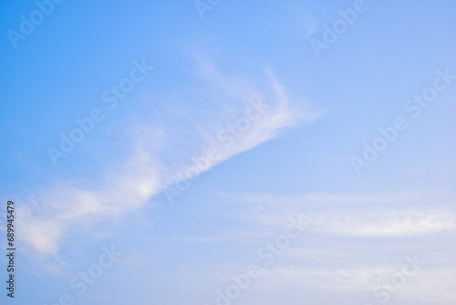 beautiful blue sky and white fluffy cloud with sunrise in the morning  natural background
