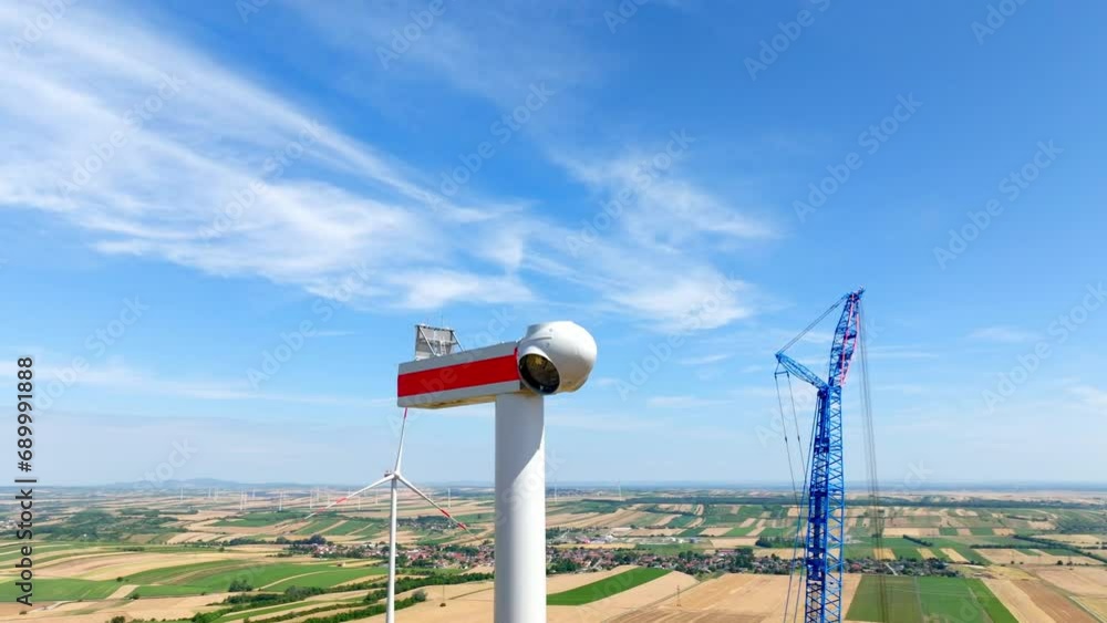 The Construction of the Wind Turbine's Head is in Progress - Aerial Panning
The Construction of the Wind Turbine's Head is in Progress - Aerial Panning