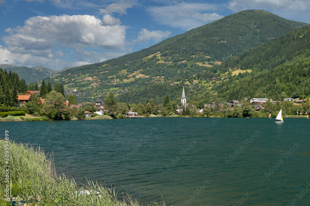 Fototapeta premium view to Village of Feld am See at Lake Feldsee,Carinthia,Austria