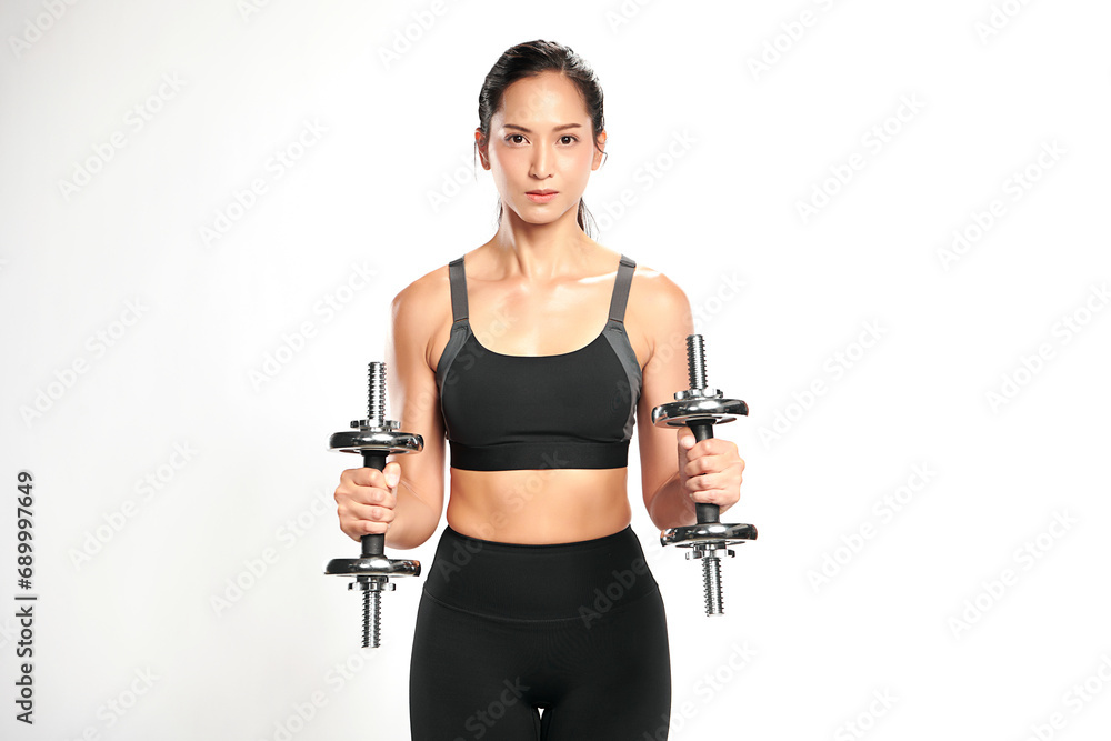 an asian woman is working out with dumbbells wearing the sport exercise suit with white background, an asian woman is working out with dumbbells wearing the sport exercise suit with white background,