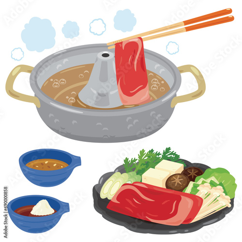 しゃぶしゃぶ鍋と皿に盛られた食材と取り皿