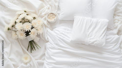 White bedding with dressing gown. Scandinavian style