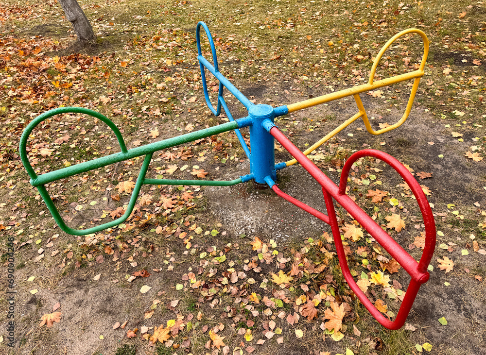 Swings on the playground in autumn