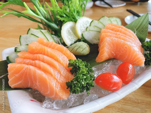 Salmon sashimi, a Japanese food, is popular all over the world.