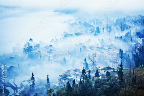 Rural town in the morning mist  Yunnan