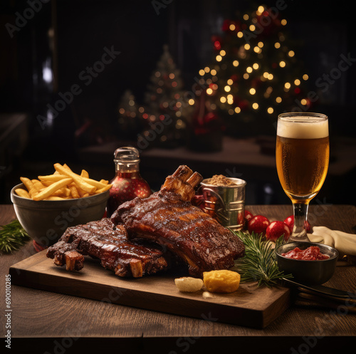 Beer being poured into glass with gourmet steak and french fries on christmas background