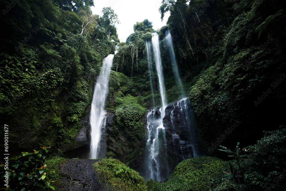 View of jungle waterfall cascade in tropical rainforest