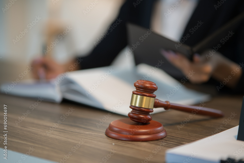 Judge gavel with Justice lawyers having team Concepts of Law and Legal services Judge gavel with Justice lawyers having team Concepts of Law and Legal services