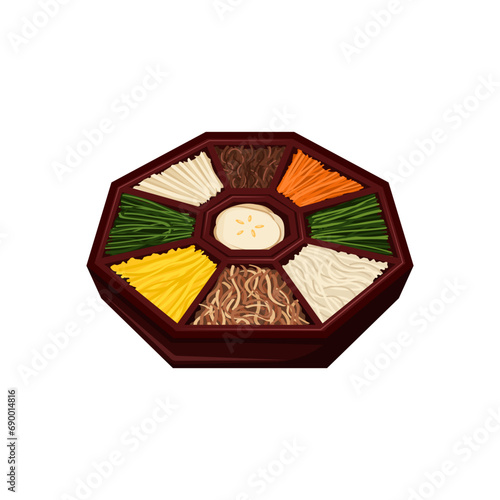 Gujeolpan an elaborate Korean dish consisting of nine different foods assorted on a wooden plate. Korean royal court cuisine