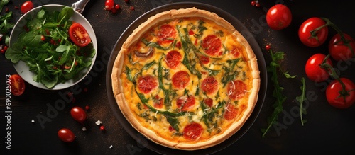 Culinary concept: Baking quiche in a ceramic dish. Ingredients shown in flat lay top view.