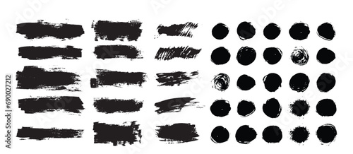 Vector black paint, ink brush stroke, brush, line or texture. Dirty artistic design element, box, frame or background for text.
 photo