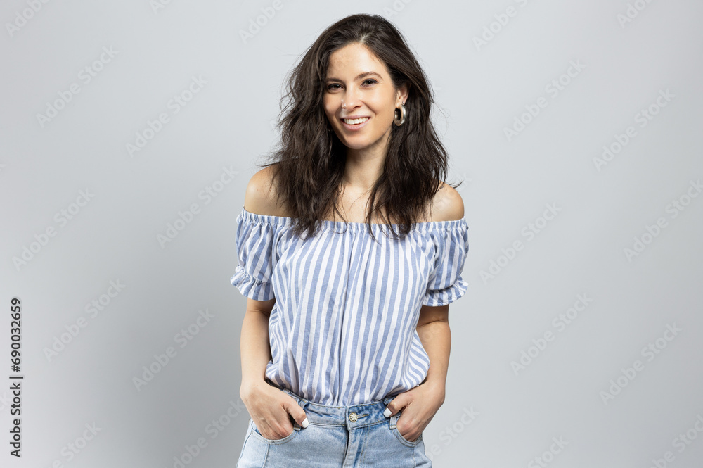 Portrait of a charming young woman, studio shot Portrait of a charming young woman, studio shot