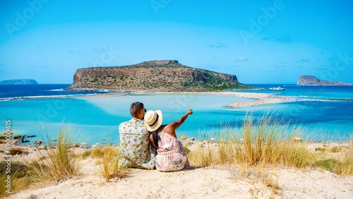 Tableau sur toile Crete Greece Balos Lagoon Crete island, Tourists relax at the crystal clear ocean of Balos Beach