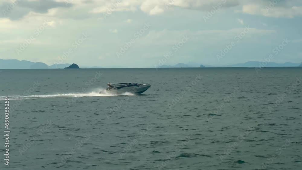 Swiftly moving from left to right across the water with speed Swiftly moving from left to right across the water with speed