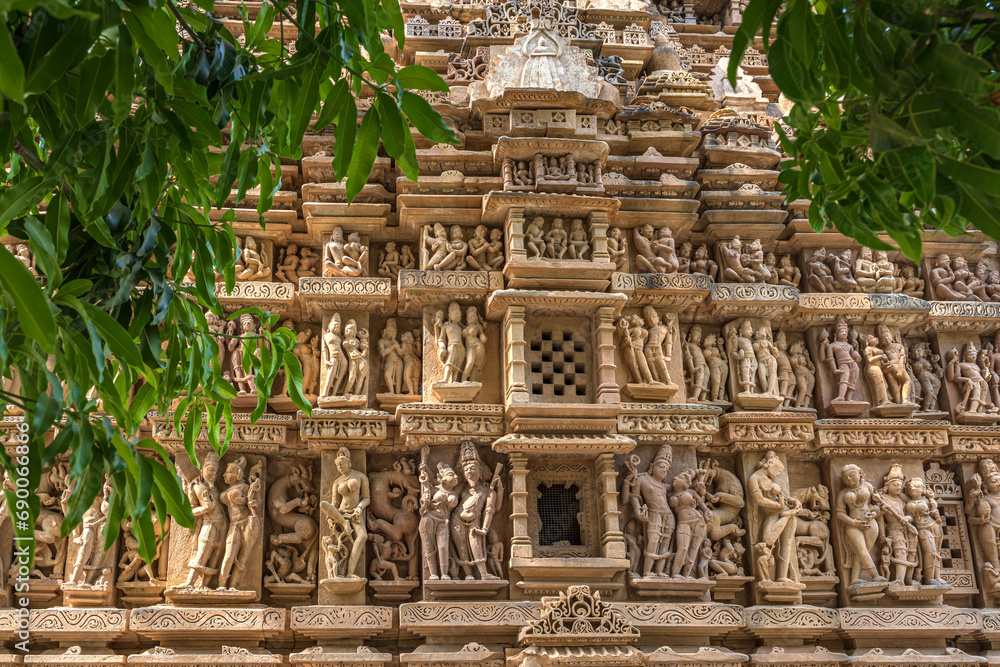 Obraz premium The Khajuraho Group of Monuments are a group of Hindu and Jain temples Khajuraho Temple, popular worldwide for its outstanding temples designs and erotic sculpture. It is a UNESCO world Heritage site.