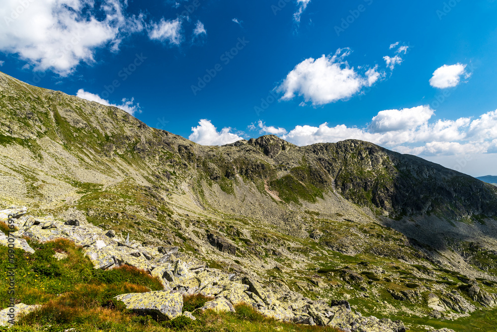 Mountain ridge with partly rocky mountain peaks in Retezat mountains in Romania Mountain ridge with partly rocky mountain peaks in Retezat mountains in Romania