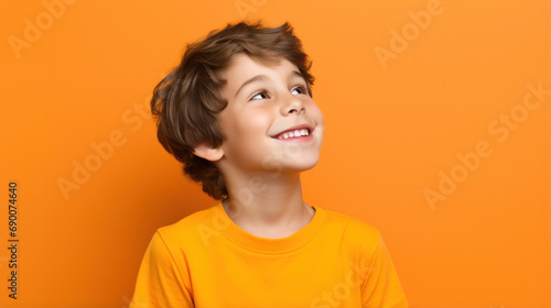 Young caucasian kid with blue eyes standing wearing elegant shirt over red background, relax profile pose with natural face with confident smile.