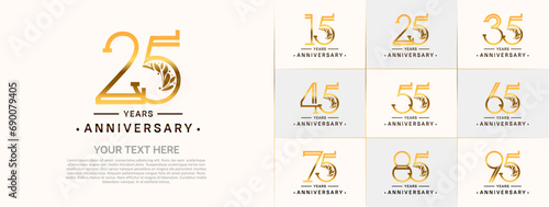 set of anniversary logotype golden and black color and ornament for special celebration event photo