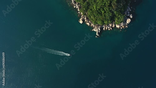 Aerial, ocean or speed boats on water in nature, sea or sailing in tourism in tropical beach. Drone, perhentian island or yacht transport on coast, holiday adventure or summer vacation in malaysia photo