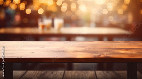 Empty wooden table desk on coffee shop with blurry background, copy space for product promotion