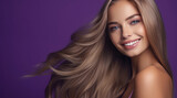 Portrait of a beautiful, sexy happy smiling woman with perfect skin and long hair, on a purple background, banner.