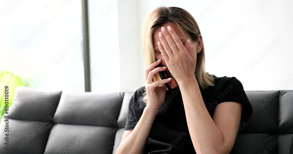 Shocked woman finding out bad news by phone and grabbing her head 4k movie slow motion. Cheated woman reaction concept Shocked woman finding out bad news by phone and grabbing her head 4k movie slow motion. Cheated woman reaction concept