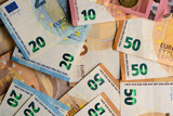 euro bills scattered on the table as a background 3