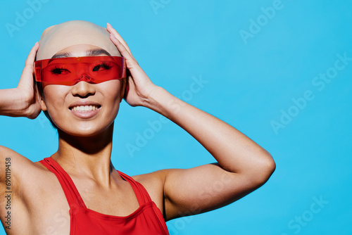 Woman sunglasses red portrait emotion white smiling asian beauty blue fashion