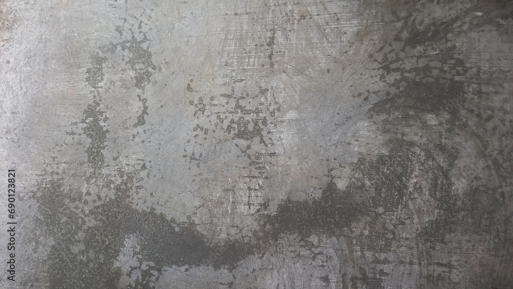 Weathered grey concrete wall with rough texture. Damaged cement wall.