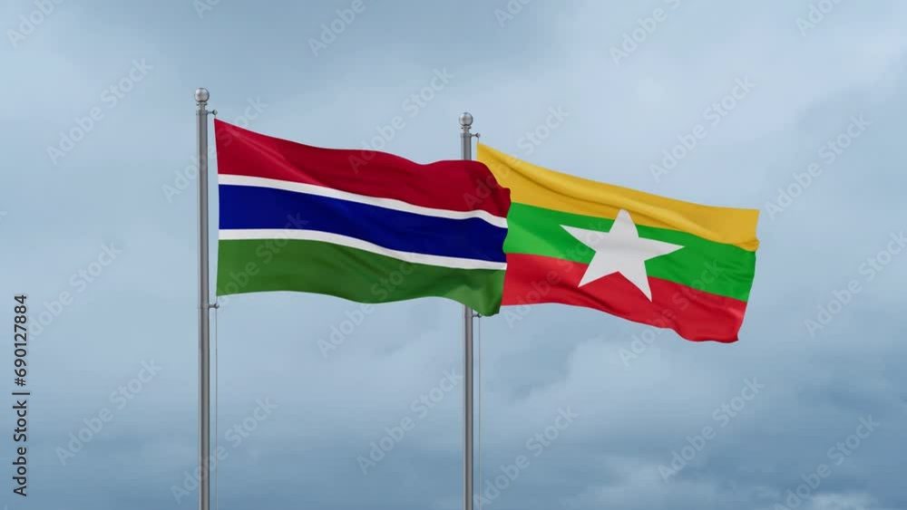 Myanmar aka Burma flag and Gambia flag waving together on cloudy sky, endless seamless loop, two country relations concept Myanmar aka Burma flag and Gambia flag waving together on cloudy sky, endless seamless loop, two country relations concept