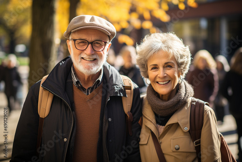 Group of elderly people walking on city street in travel tour