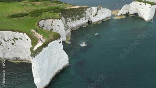 Drone shot of Old Harry Rocks, chalk formations at Handfast Point, England, UK photo