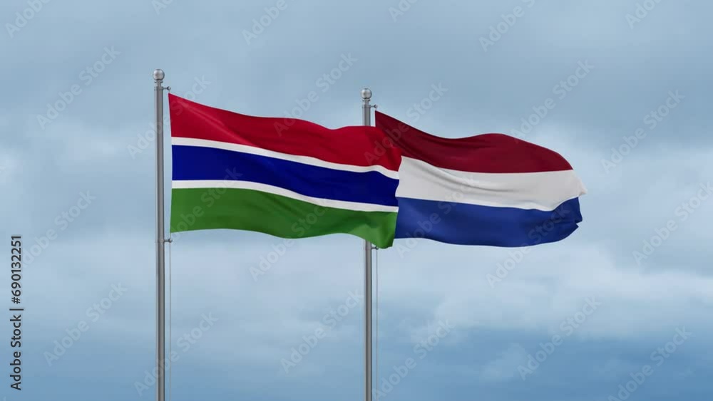 Netherlands flag and Gambia flag waving together on cloudy sky, endless seamless loop, two country relations concept Netherlands flag and Gambia flag waving together on cloudy sky, endless seamless loop, two country relations concept