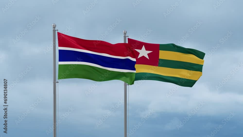 Togo, Togolese Republic and Gambia flag waving together on cloudy sky, endless seamless loop, two country cooperation concept Togo, Togolese Republic and Gambia flag waving together on cloudy sky, endless seamless loop, two country cooperation concept