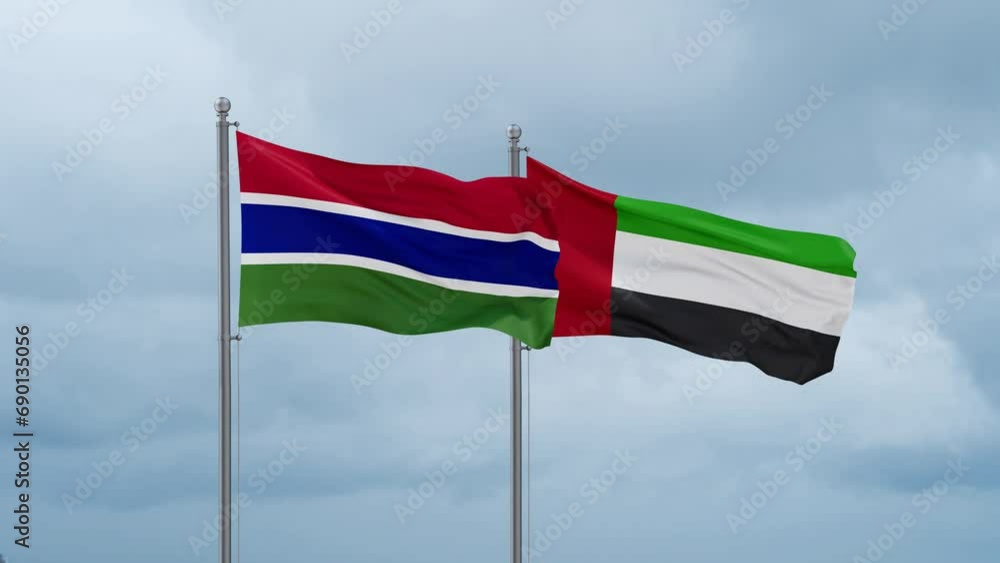 United Arab Emirates and Gambia flag waving together on cloudy sky, endless seamless loop, two country cooperation concept United Arab Emirates and Gambia flag waving together on cloudy sky, endless seamless loop, two country cooperation concept