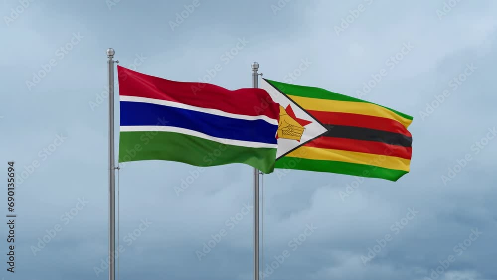 Zimbabwe and Gambia flag waving together on cloudy sky, endless seamless loop, two country cooperation concept Zimbabwe and Gambia flag waving together on cloudy sky, endless seamless loop, two country cooperation concept