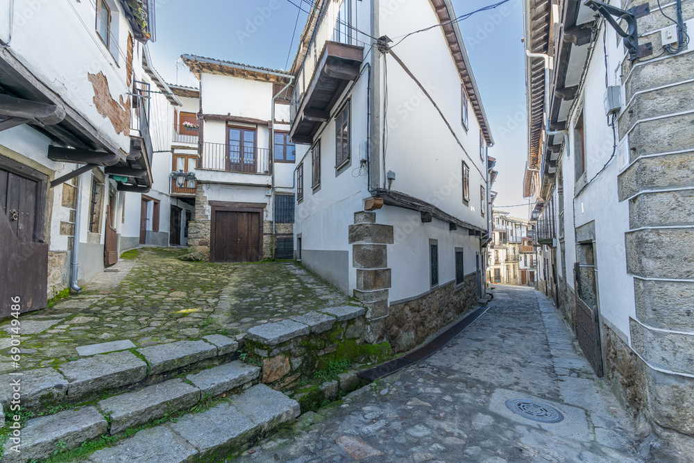Street and traditional houses of the beautiful town of Candelario, in Salamanca.