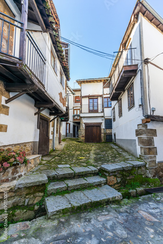 Street and traditional houses of the beautiful town of Candelario, in Salamanca.