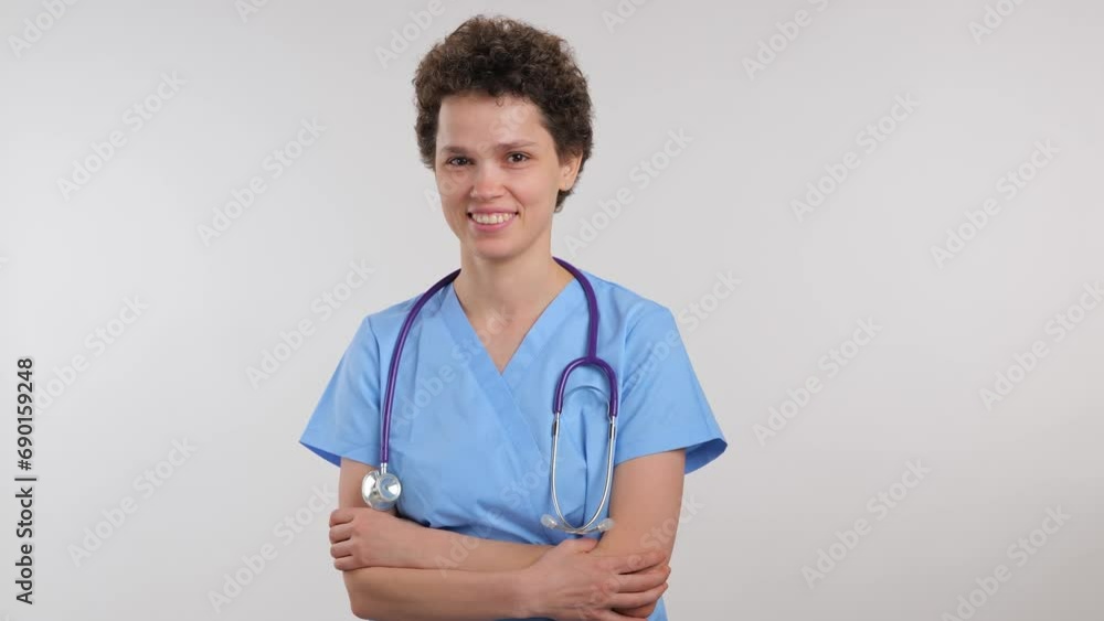 happy Medical Doctor Crosses Hands, Looks at Camera and smile happy Medical Doctor Crosses Hands, Looks at Camera and smile