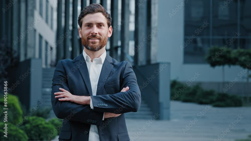Successful confident Caucasian man businessman professional manager executive director leader entrepreneur ceo posing with crossed arms outdoors near corporate office building male business portrait Successful confident Caucasian man businessman professional manager executive director leader entrepreneur ceo posing with crossed arms outdoors near corporate office building male business portrait