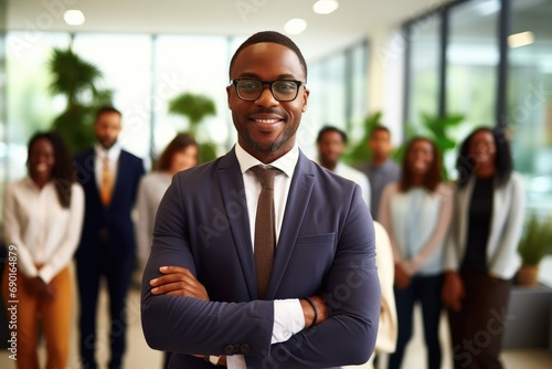 Portrait of a smiling african american businessman with his team in the background, African American Businessman Boss With Group Of Business People In Creative Office, AI Generated
