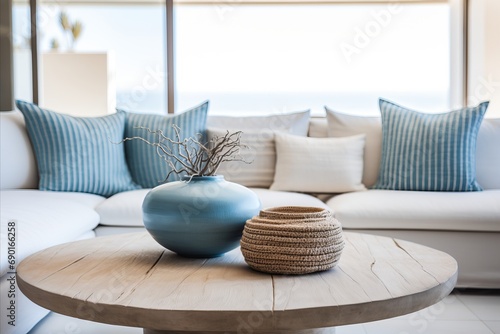 Close-up of Rustic Coffee Table with Flower Vase in Coastal-style Modern Living Room Interior