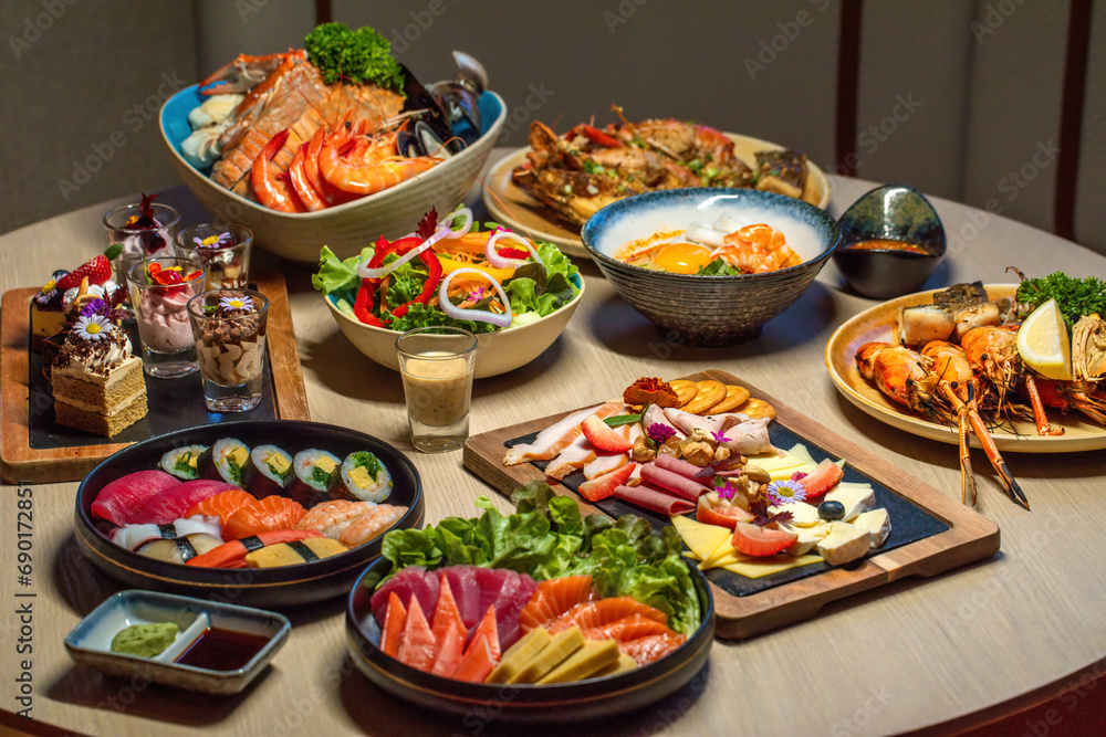 Assorted traditional Japanese dishes on table. Authentic Asian cuisine and dining. Assorted traditional Japanese dishes on table. Authentic Asian cuisine and dining.